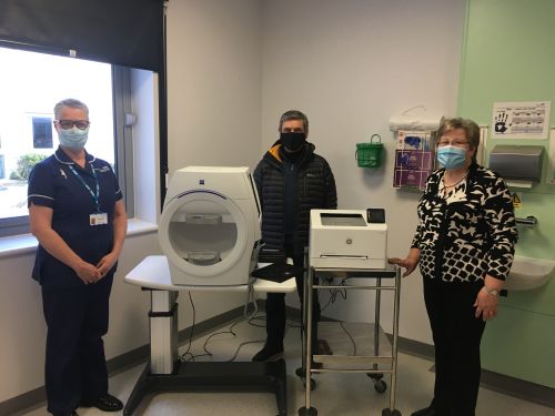 Lincolnshire Community Health Services NHS Trust deputy clinical team lead Tracey Hallam (left) shows the Visual Fields machine to Pennygate Patient Link chairman Renzo Gheradi (centre) and vice chairman Carol Modd (right). 
